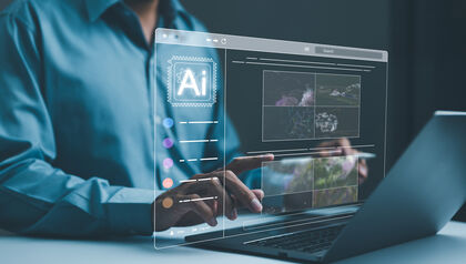 Man using a laptop with an AI program
