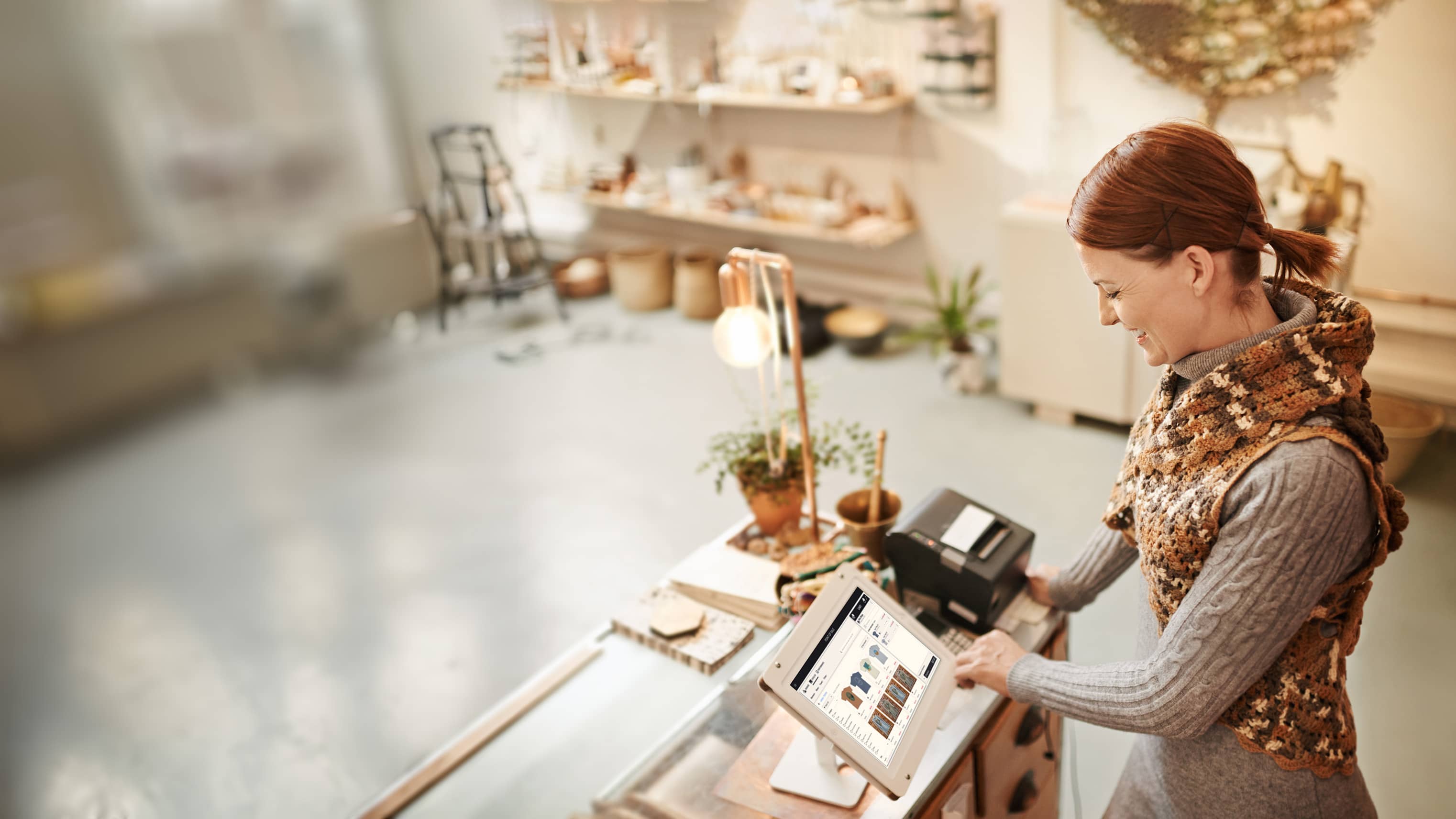 Store associate using Manhattan POS system for a transaction in a store