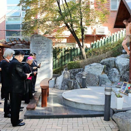 Korean Knights gather on October 24, 2020 in anticipation of Father Michael J. McGivney’s beatification to pray at the ordinariate's chancery garden.