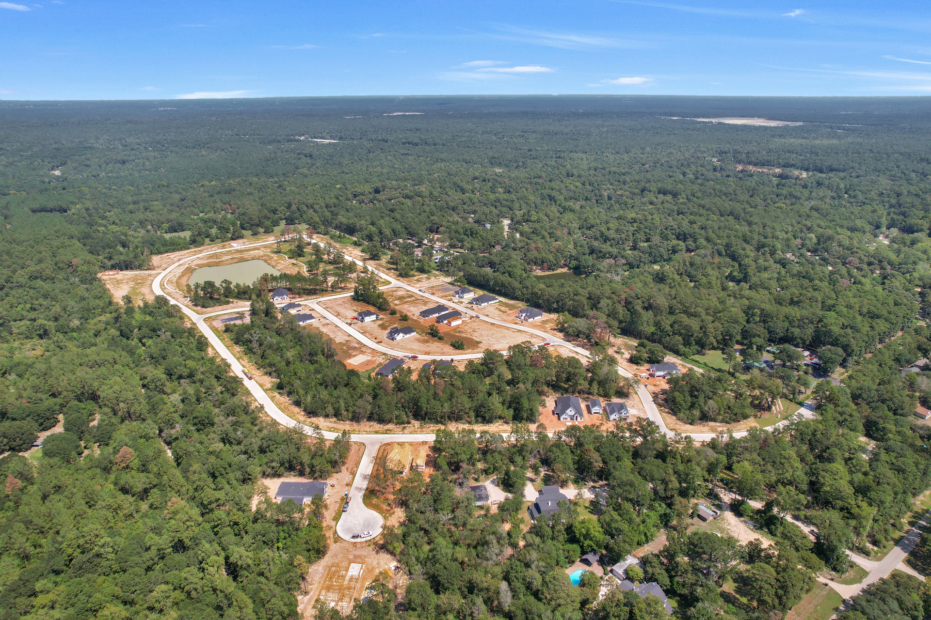 100' Wooded & Waterfront Homesites Available