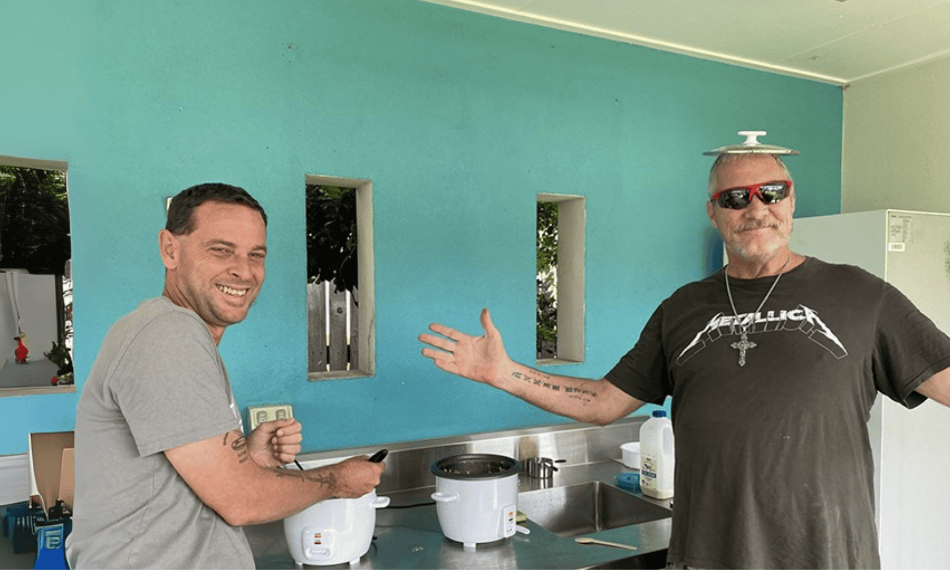 Cafe One trainees cooking together in a community kitchen
