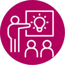 Icon that looks like one person standing in front of a whiteboard with lightbulb on it, in front of an audience of two people - icon is placed in maroon circle with the icon outlined in white