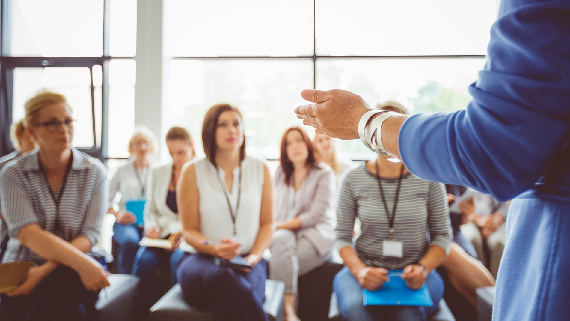 content-media-row_upcoming-training.jpg Group of people attending training session