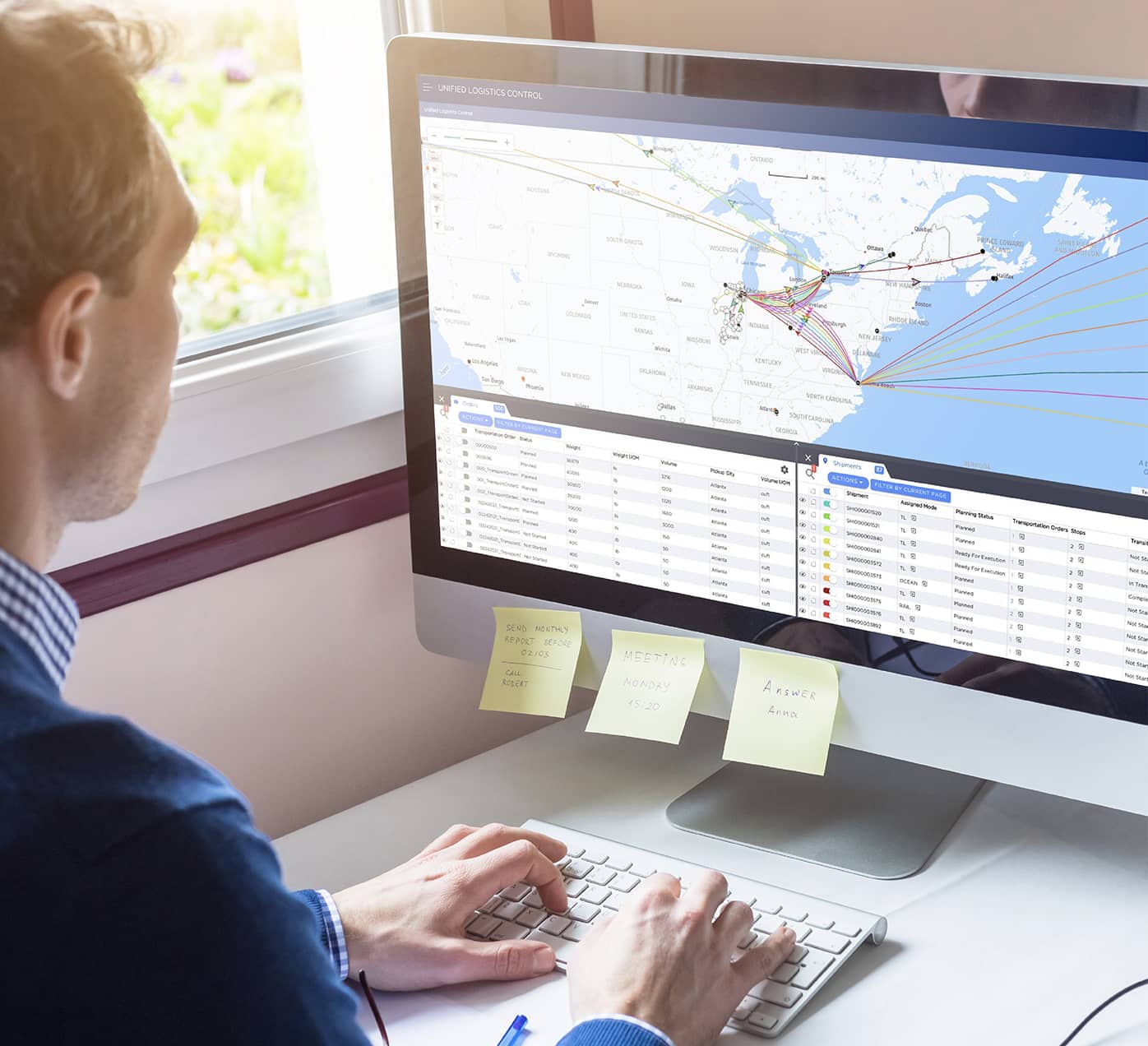 Man using TMS software on a computer