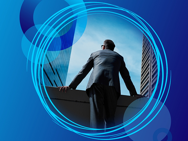 A businessman in a suit stands with his back to the camera, looking out over a city skyline between two skyscrapers, framed by concentric blue circles on a gradient blue background.