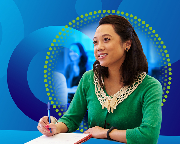 An abstract graphic of overlapping blue and green circles, with green dotted arcs, against a white background.