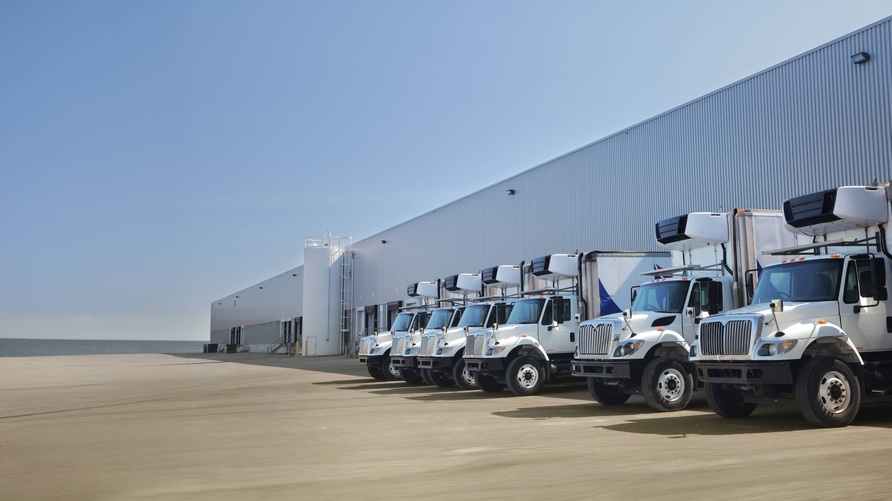 Trucks being loaded at a trucking depot