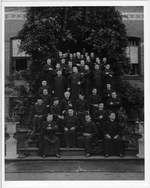 Father McGivney photographed with fellow priests.