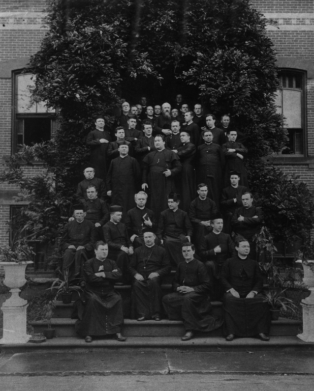 Father McGivney photographed with fellow priests.