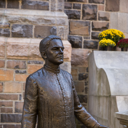 Statue of Father Michael J. McGivney by Stanley Bleifeld outside St. Mary's Church, New Haven, CT on October 31, 2020.