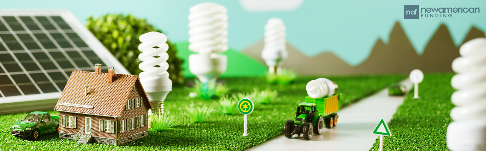 Model of eco-friendly symbols and objects like energy-efficient lightbulbs