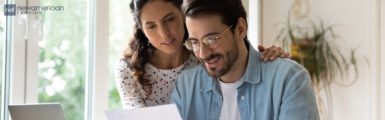 couple looking over paperwork