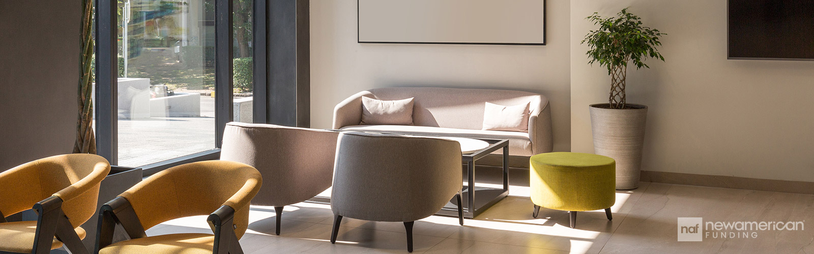 The inside of a living room full of modern furniture 