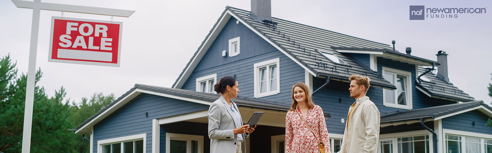 homebuyers viewing a house with their real estate agent