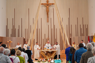 Archbishop Richard W. Smith of Edmonton celebrates a rededication Mass at Sacred Heart Church of the First Peoples on July 17. (Photo by Lincoln Ho)