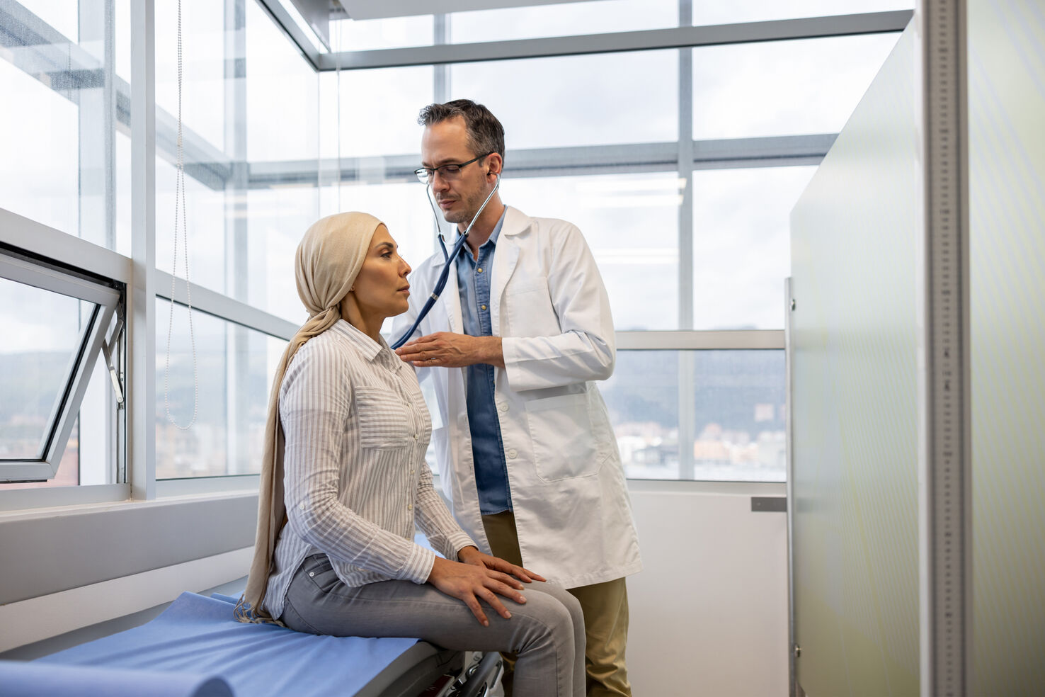 Female patient getting exam at clinic