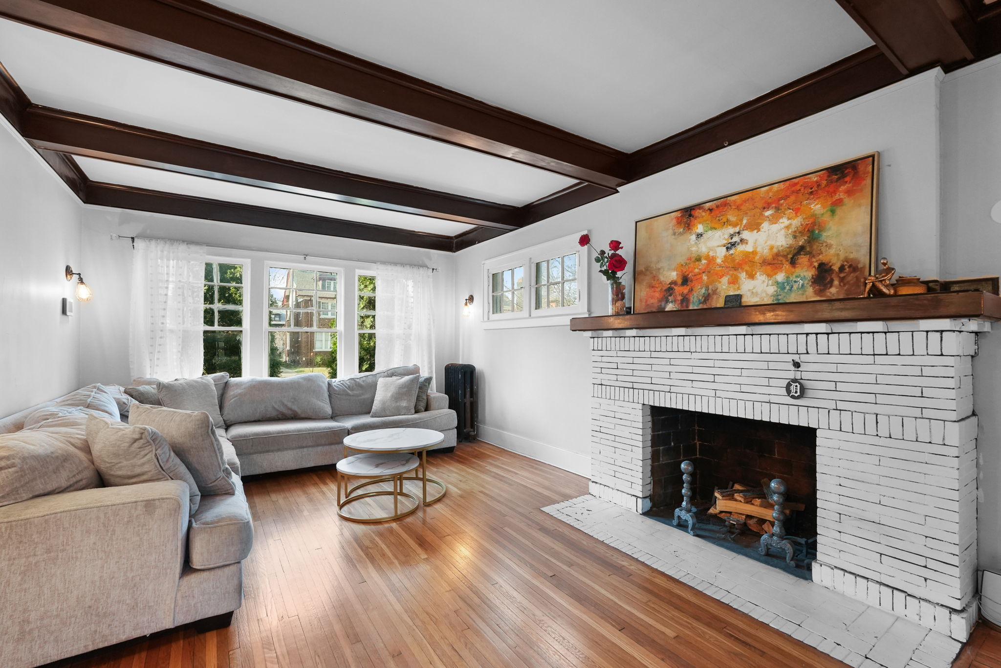 A living room with a fireplace in Detroit.