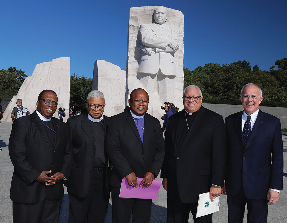 Rev. William Bass; Rev. Eugene Rivers III,; Bishop Edwin Bass; and Jesuit Bishop George Murry
