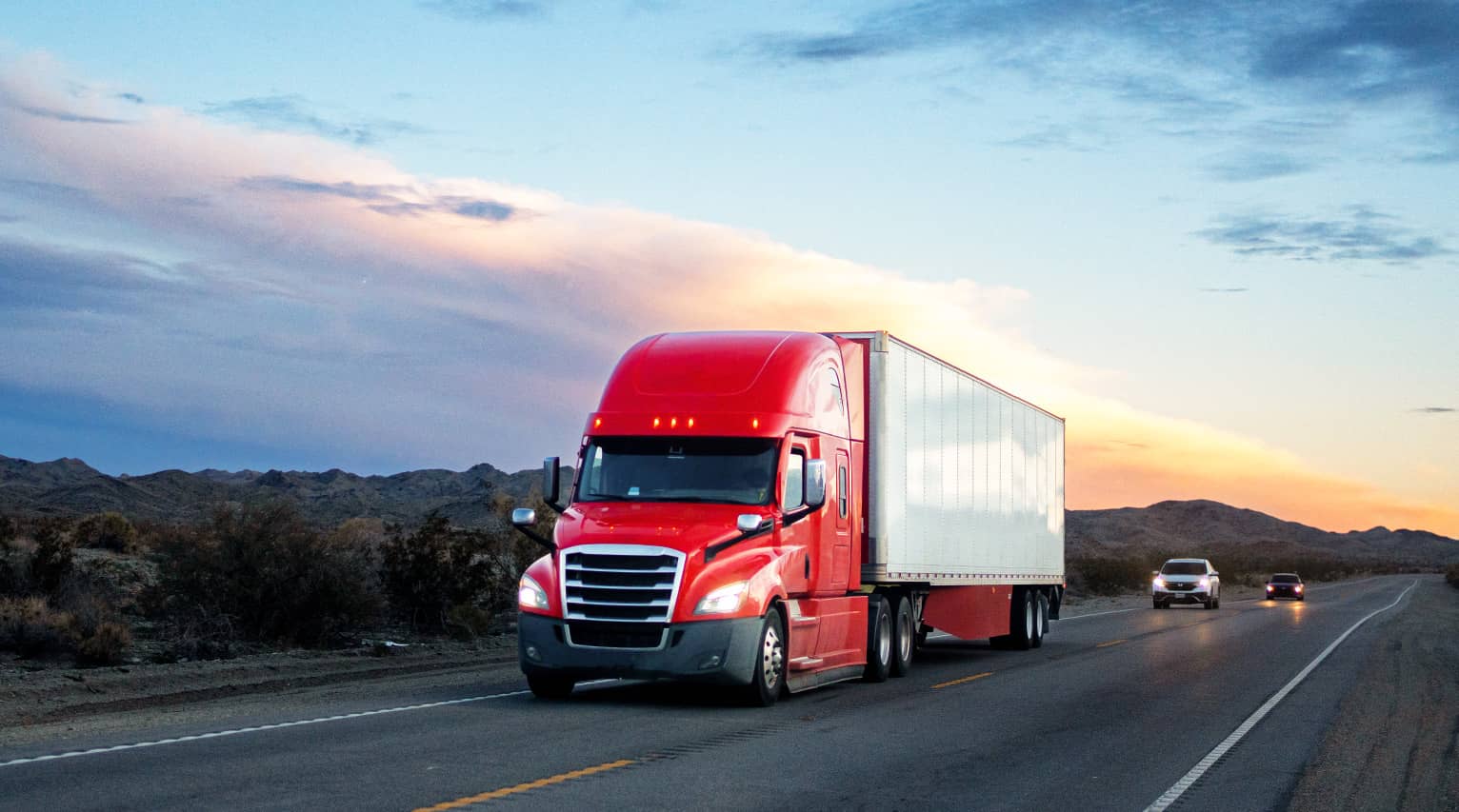 Truck at a depot with a container unloading
