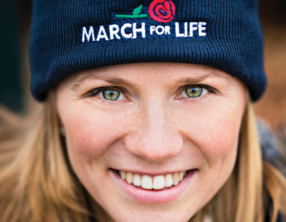 Mary Forr wears a ski cap with the March for Life logo embroidered on the front