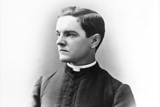 Black and white portrait of Father McGivney