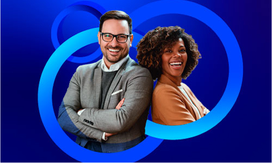 A smiling man in a suit jacket and glasses stands back-to-back with a smiling woman with curly hair, also in professional attire. They have their arms crossed. The background is a bright blue with concentric blue circles.