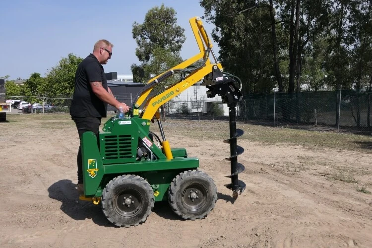 Mini loader at work