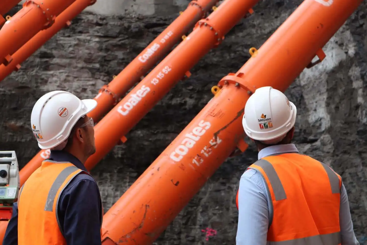 Engineers with hydraulic struts