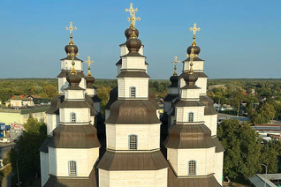Holy Trinity Cathedral in Novomoskovsk — the largest wooden church in Ukraine — was one of the first buildings scanned by the conservation team. The 18th-century structure, seen here in October, is located less than 75 miles from the current front line between Ukrainian and Russian forces. (Photo by Ihor Bokalo)