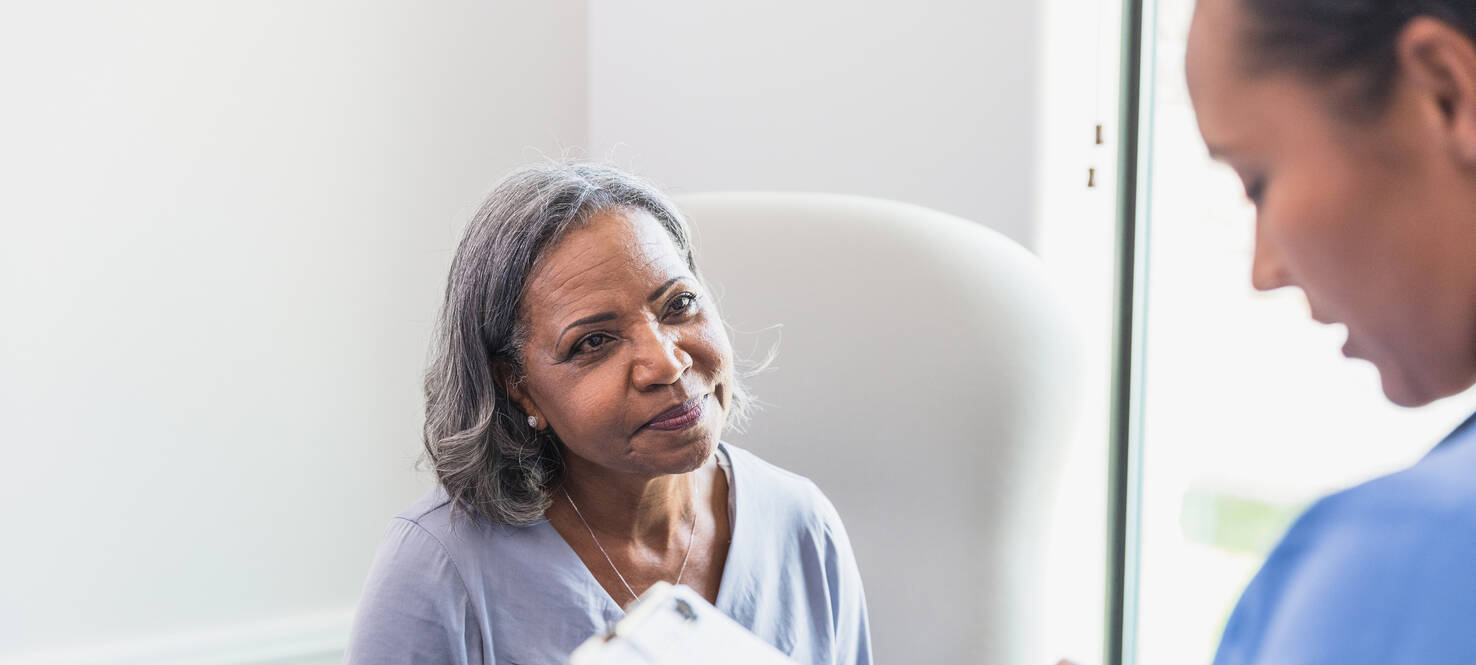 patient checks into clinic