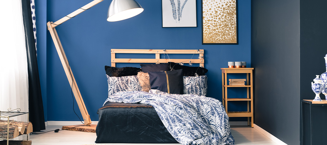 Bedroom painted in bright blue