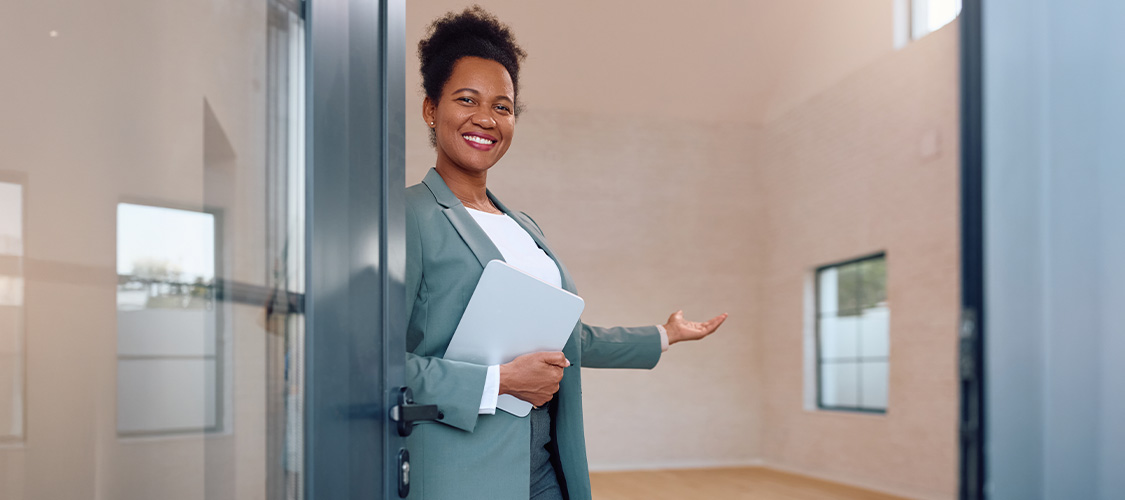 A real estate agent showing a home