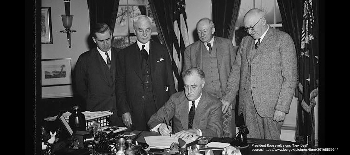 Roosevelt signing the New Deal