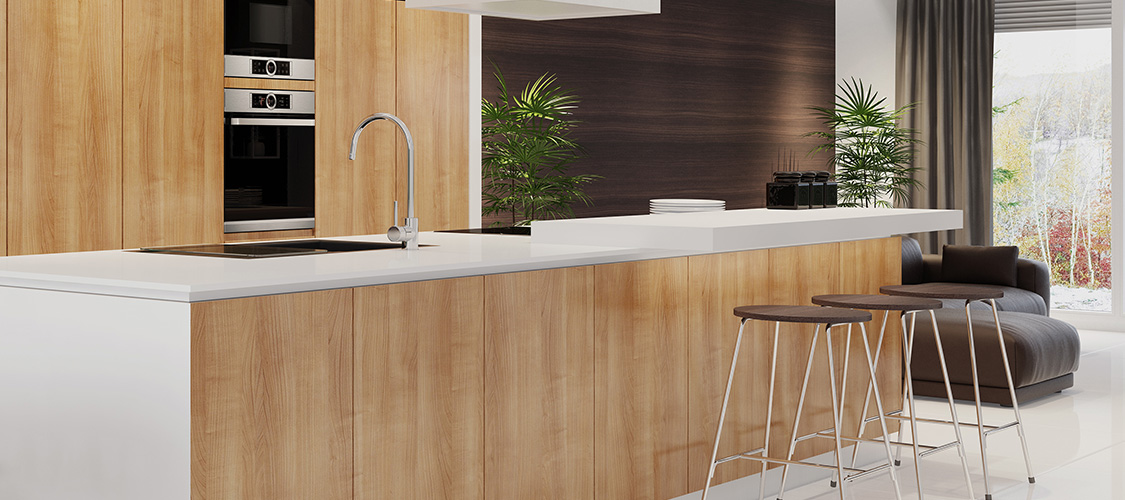 A modern kitchen with wood cabinets