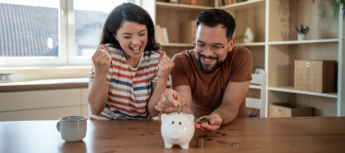 Saving money in a piggy bank