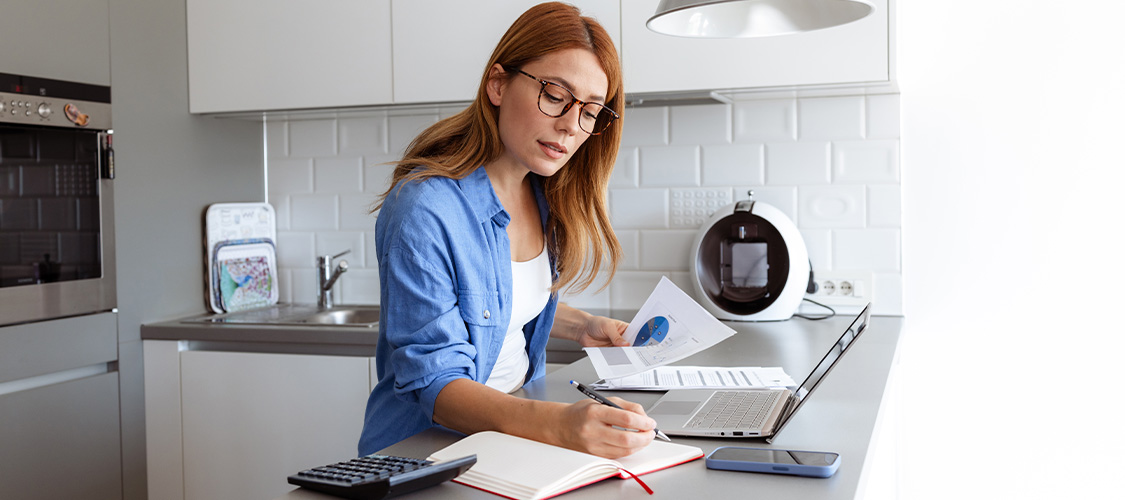 A woman setting up a budget