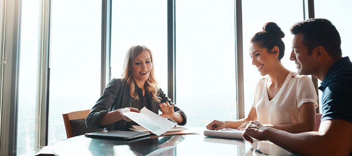 Owners consulting with a loan officer