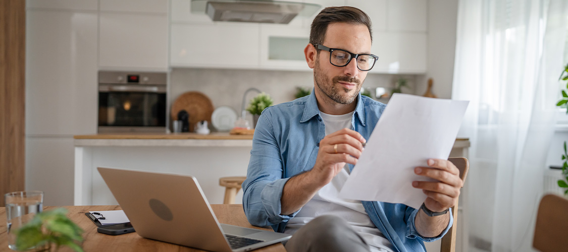 A homebuyer reviewing financial documents