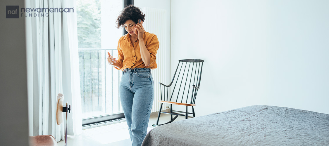 A woman talking on the phone.