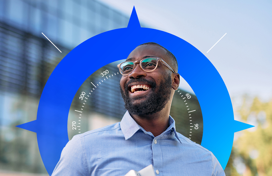 Smiling man in business outfit, graphic of a compass in the background