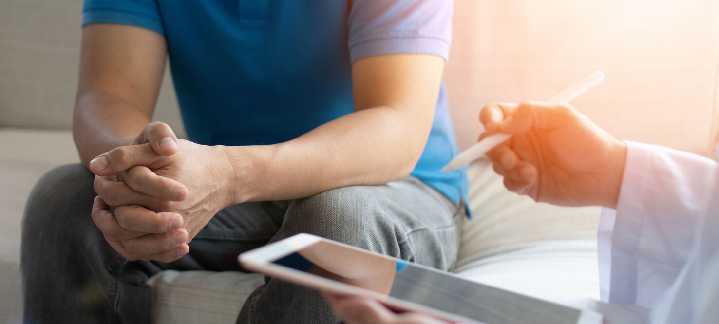 Doctor consults with patient
