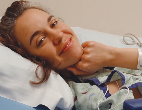 Michelle smiles from her bed at a cancer hospital in Zion, Ill., in 2015. (Courtesy of the Duppong family)