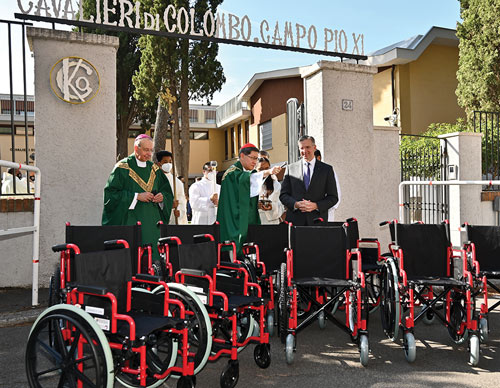 Cardinal Luis Antonio Tagle blessing wheelchairs