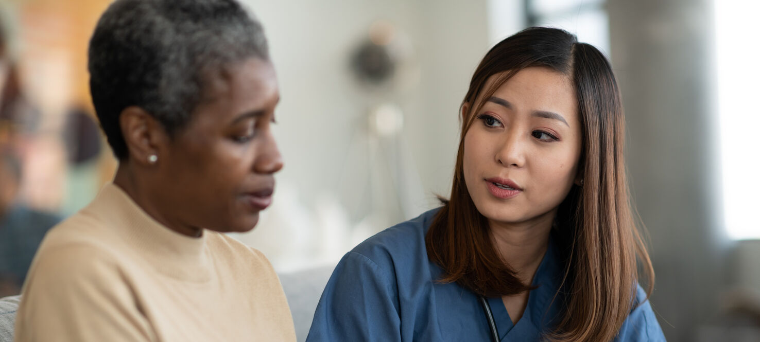 Patient with small intestine cancer risk factor speaks with nurse