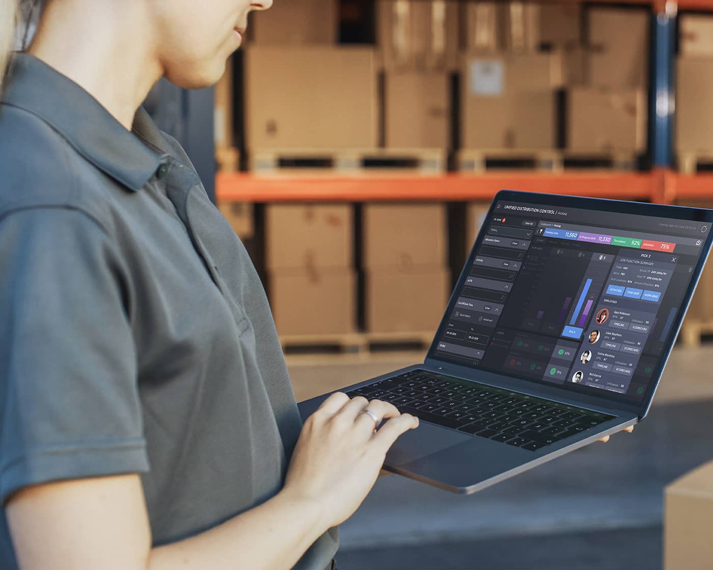 smarter-optimization.jpg Warehouse worker looking at a laptop