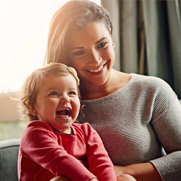 mother and daughter posing