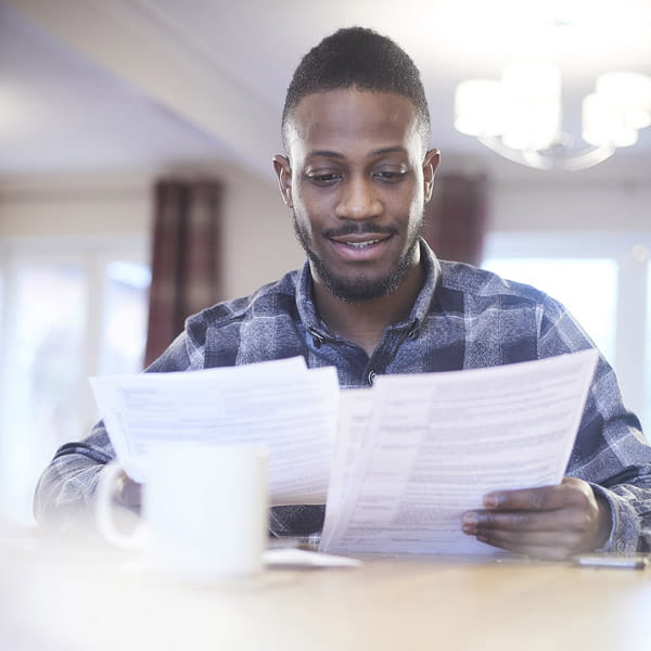 man looking over documents