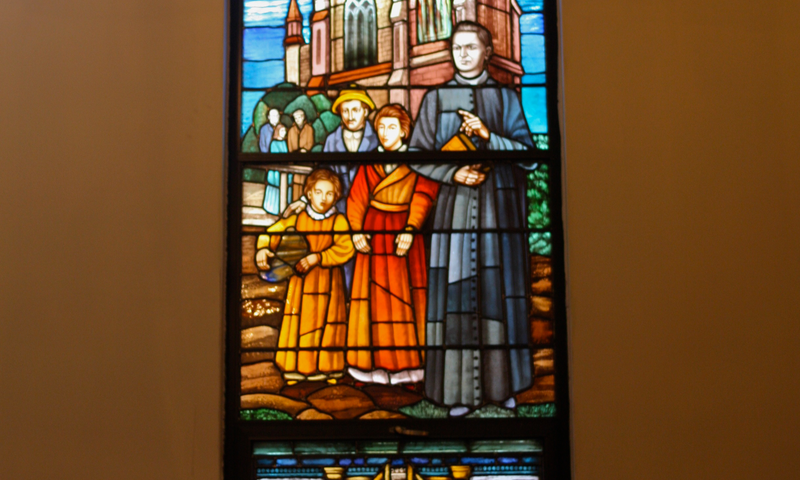 A stained-glass window depicting Father McGivney at St. John Fisher Seminary, Connecticut.