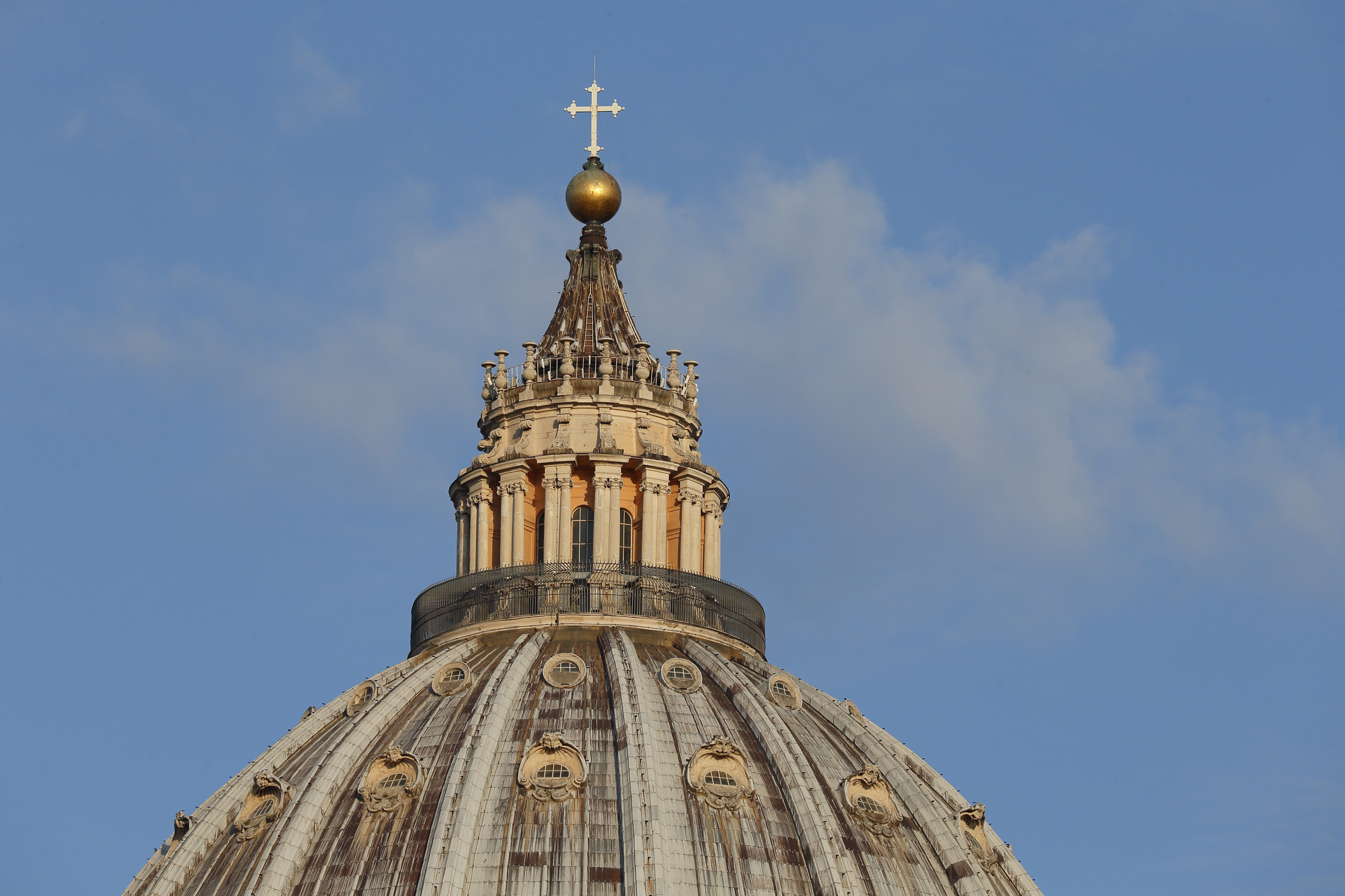 Close up photo of Saint Peter's Basilica Dome in Vatican City, Rome Italy.