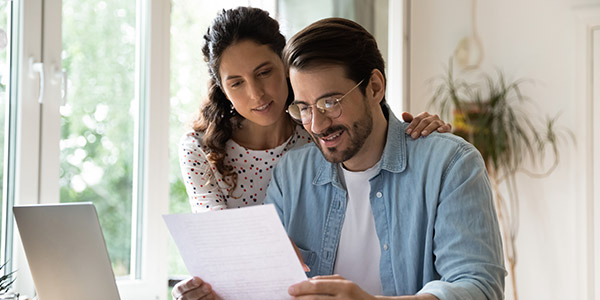 couple looking over paperwork